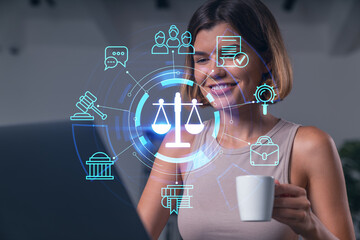Thoughtful businesswoman in casual wear typing on laptop at office workplace with coffee cup....