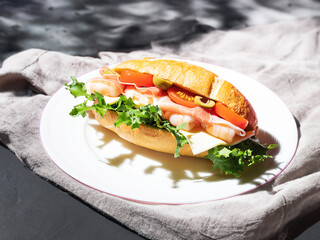 sandwich with ham and vegetables