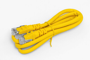 yellow network cable, isolated on white background. Closeup LAN cables with connector. Lan cable for internet network connection.