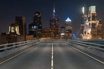 Foto op Aluminium Empty urban asphalt road exterior with city buildings background. New modern highway concrete construction. Concept way to success. Transportation logistic industry fast delivery. Philadelphia. USA. © VideoFlow