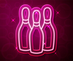 Glowing neon line Bowling pin icon isolated on red background. Juggling clubs, circus skittles. Vector