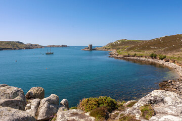 Cromwell's Castle, New Grimsby Sound and a single moored yacht: Tresco, Isles of Scilly, UK