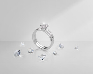 Elegant diamond ring and Shiny brilliant diamond placed on gray background