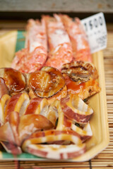 Seasoned grilled seafood at traditional market