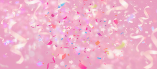 Colorful confetti festival on pink background with blurry elements.