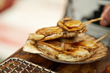 Grilled scallops at traditional market
