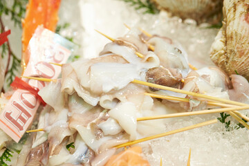 Fresh seafood skewers at traditional market