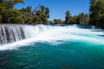 Manavgat waterfall Manavgat River is near the city of Side, 3 km north of Manavgat in Turkey. A...