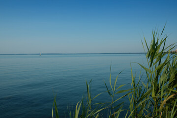 Naklejka na ściany i meble View of the Lake Balaton in the evening.Summer season.