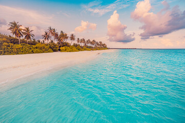 Fantastic closeup calm sea waves, sand with colorful sunrise sunset light sky. Tropical island beach. Travel landscape, exotic shore coast. Summer vacation holiday amazing nature. Relax paradise scene