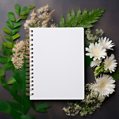 Notebook mock up on with green plant and flowers on green background. Space for text. Top view. Greetings template. Generative ai