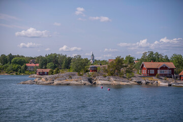 Island, skerries and islet, in the middle part of the archipelago. The church on the island Möja, a sunny summer day in Stockholm