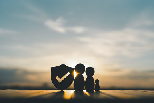 Shield protect icon and family model, Security protection and health insurance. The concept of family home, protection, health care day, car insurance.