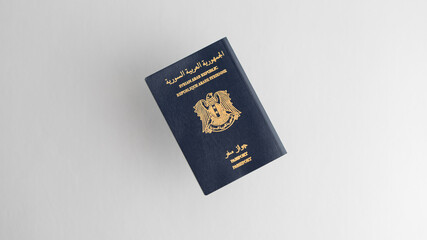 close-up photo of Syrian passport, on white background.