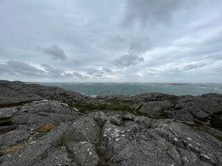 Cloudy wide landscape sea and rocks