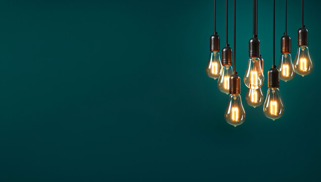 Hanging Light Bulbs on Green Background - AI-Generated