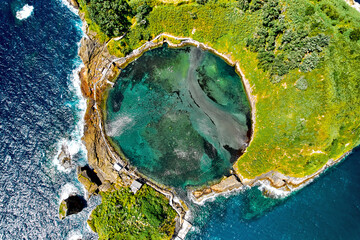 Aerial shot, drone point of view of picturesque Islet of Vila Franca do Campo. Sao Miguel island,...