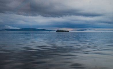 cloudy evening on Lake Champlain with Juniper Island and Dunder Rock in Burlington, Vermont
