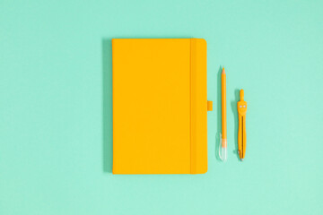 Back to school background. Flat lay, top view of school accessories, notebook, pens on isolated...