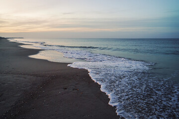 Sunset Over Low Tide Waves