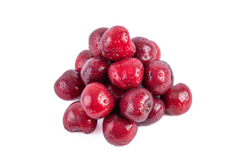 Pile of red sweet cherries in drops of water. Fruits isolated on white background.