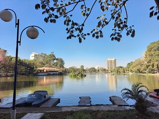 Araras, S&atilde;o Paulo, Brazil - July 1, 2022. Panoramic view of the lake, deck, pedal boats and buildings located in the Municipal Ecological Park of Araras "Gilberto R&uuml;egger Ometto".