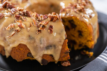 Chocolate pumpkin bundt cake with toffee glaze