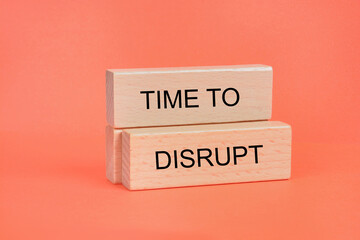 Words Time to disrupt on wooden blocks 