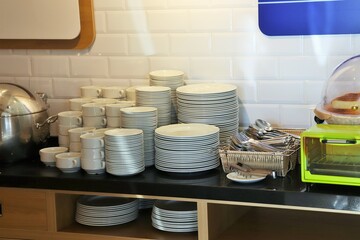 Plates, cutlery, Swedish breakfast in the hotel
