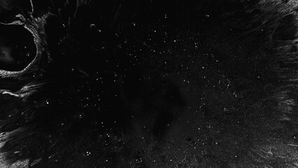 Grain splash. Mysterious dark galaxy. Black glitter ink spreading dirty surface night star sky...