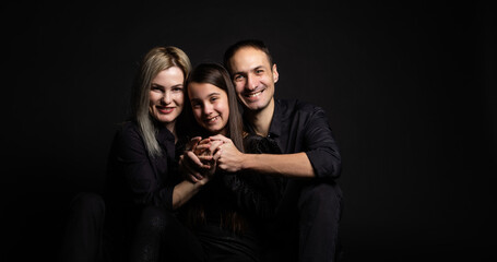 family on a black background