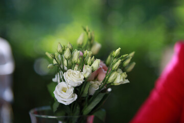 elegant bouquet of white roses and greenery