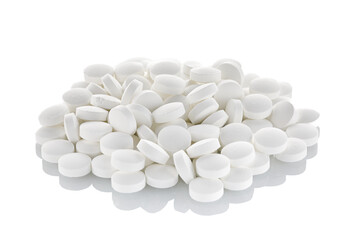 Fototapeta na wymiar A pile of tablets isolated on a white background. Close-up