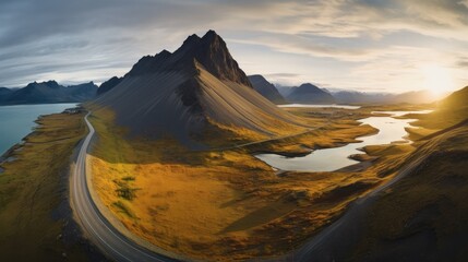 Fototapeta na wymiar scenic road with mountains and coast at sunset, Beautiful nature landscape aerial view.