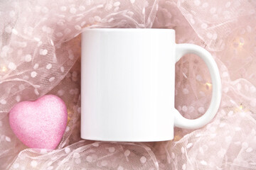 white mug on a pink background with heart and lights. Valentine's day and mother's day mug mock up