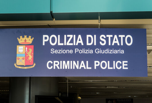Italian Criminal Police sign written both in Italian and English language in Leonardo da Vinci International Airport in Fiumicino, Rome, Italy