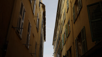 Worms eye slow motion shot of old town of Nice in spring
