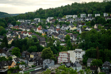 Fototapeta na wymiar The city of Siegen in Germany against the background of the sky and the forest