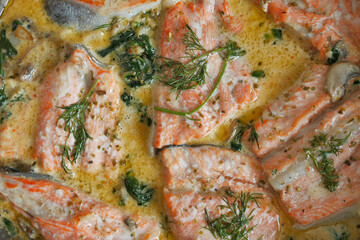 baked salmon fish in a large bowl 