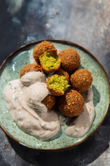 fried falafel with white sauce