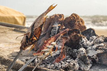 Fish Barbeque on the beach in Malaga, Andalusia, Spain - obrazy, fototapety, plakaty