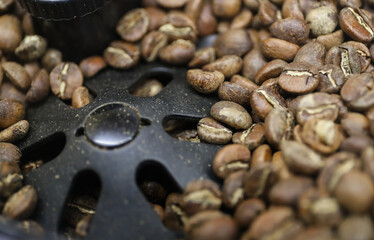 Coffee beans during grinding in a coffee machine