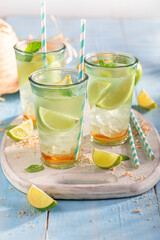 Fresh lemonade made of lime and lemons.