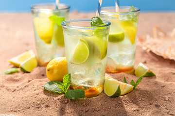 Sour lemonade with citrus and mint leaves.