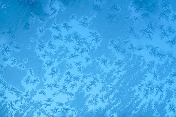 frost crystal on window glass in winter season