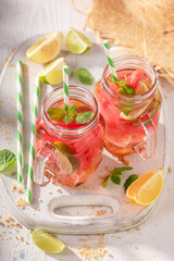 Healthy lemonade with sugar, mint and ice.