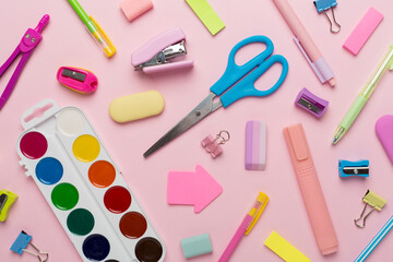 Flat lay with colorful school stationery on color backgroung, top view