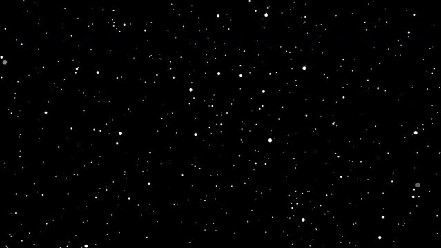 Small white particles flying isolated on black background imitation of space flight through stars