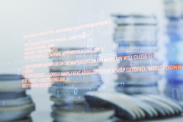 Double exposure of abstract programming language interface on growing stacks of coins background, research and development concept