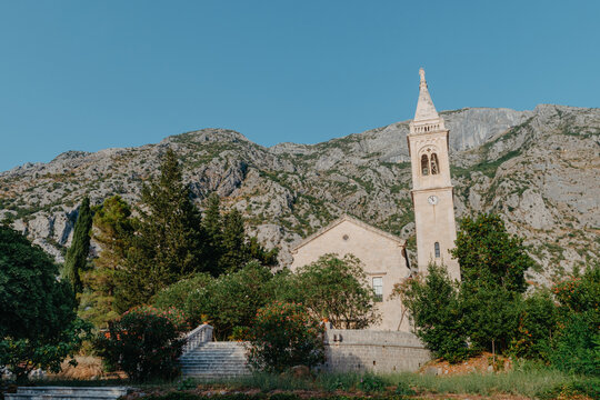 Beautiful view of the coast of Kotor Bay and St.Eustace's Church in the village Dobrota in Montenegro. Church of St. Eustachius is located in Dobrota , Kotor Montenegro.
